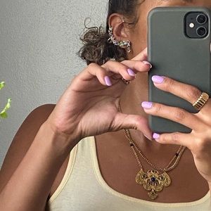 Gold necklace with blue accents